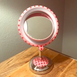 Lighted, Enlarging Vanity Mirror